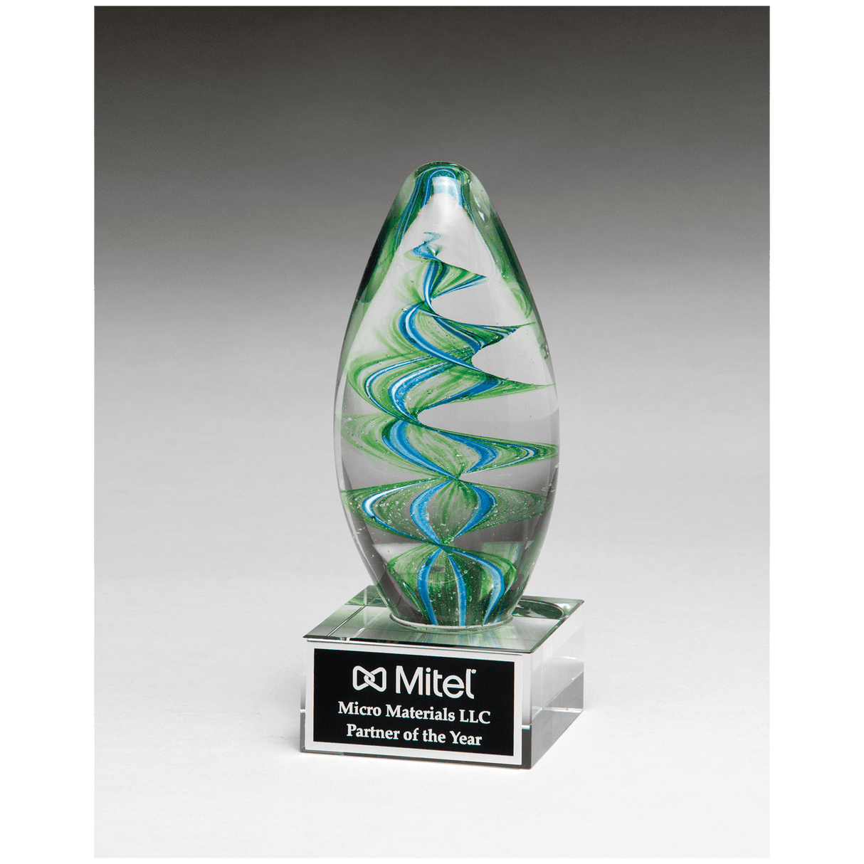 6 1/2" Blue and Green Helix Egg Shaped Art Glass on Clear Glass Base with Black Laserable Aluminum Plate