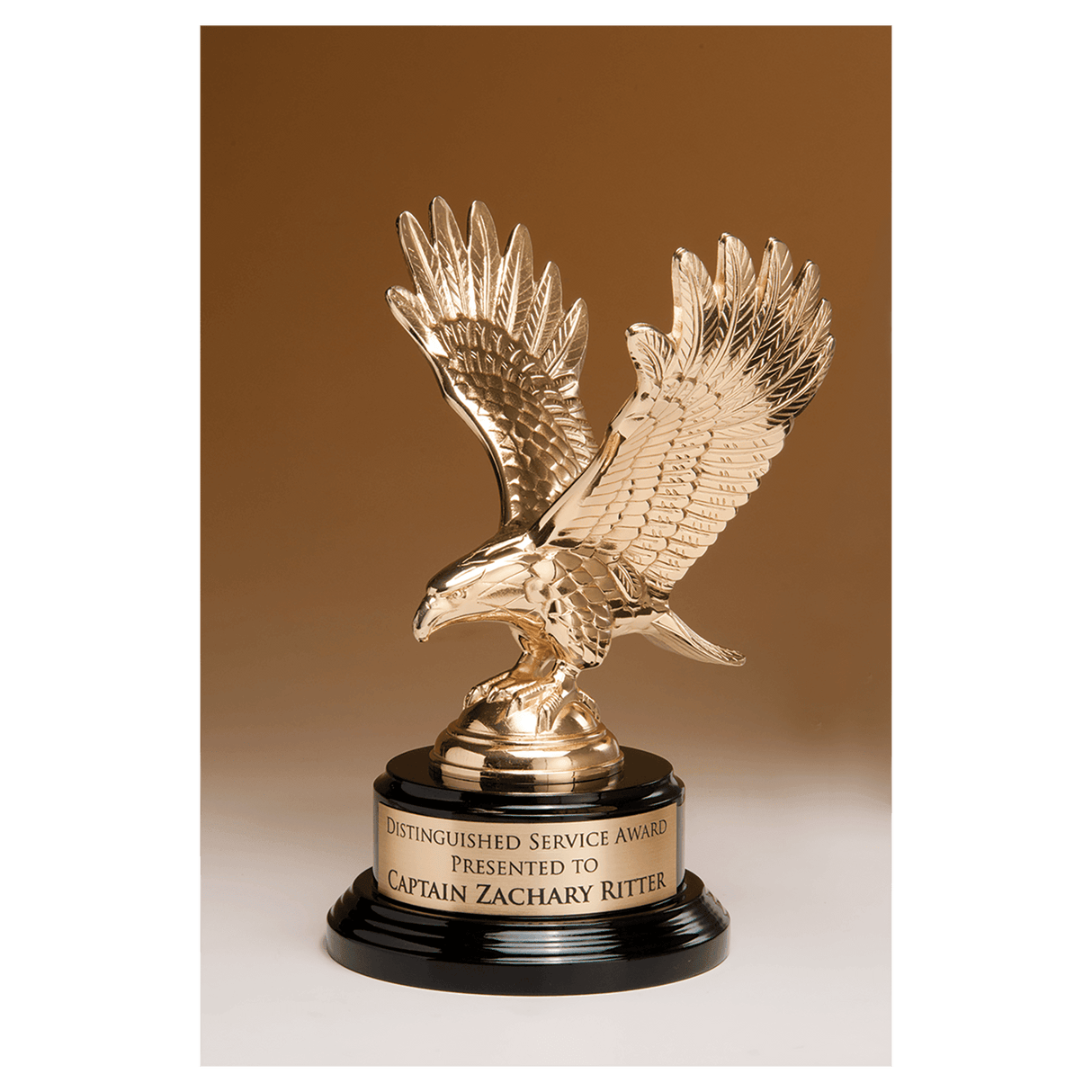 9" Fully Modeled Gold Finish Metal Eagle on a Black Piano Finish Base with a Gold Flex-Brass Plate